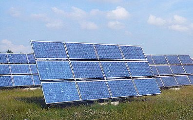 A field full of photovoltaic arrays.